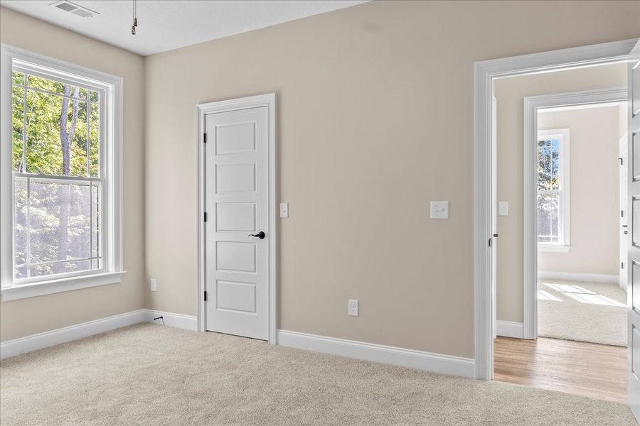 Representative unfurnished interior of a home built from the Converse Elite by Enchanted Homes in Pointe Summit, Slater-Marietta (Image 63).