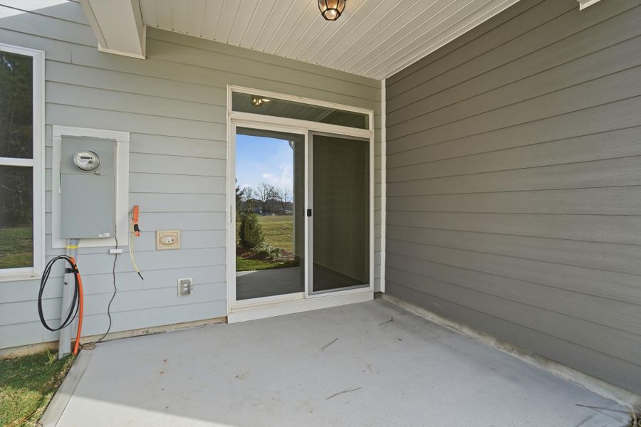 Exterior details and patio area of a home in Blythe Mill Townhomes, Waxhaw (Image 18). Exterior details and patio area of a home in Blythe Mill Townhomes, Waxhaw (Image 18).