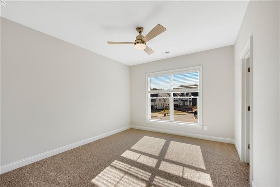 Spacious, unfurnished interior of a new home in The Retreat at Caney Creek, Alpharetta (Image 58).