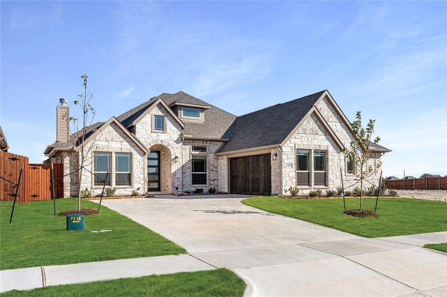 Front exterior of a new home in Villages of Walnut Grove, Midlothian, TX, highlighting curb appeal (Image 21).