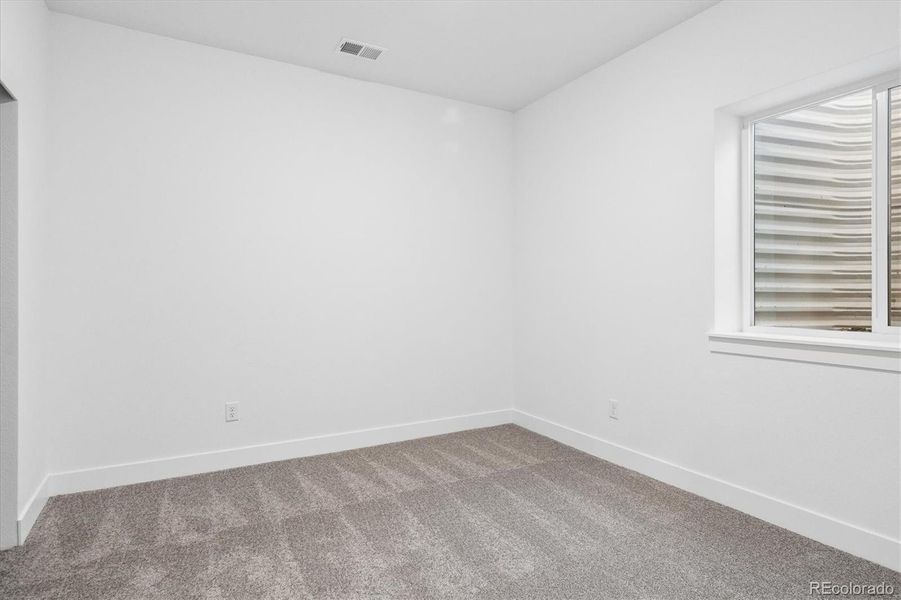 Spacious, unfurnished interior of a new home in Peakview at Ascent Village, Littleton (Image 31).