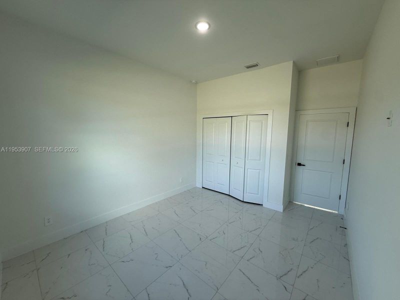 Spacious, unfurnished interior of a new home in , Lehigh Acres (Image 24). Spacious, unfurnished interior of a new home in , Lehigh Acres (Image 24).