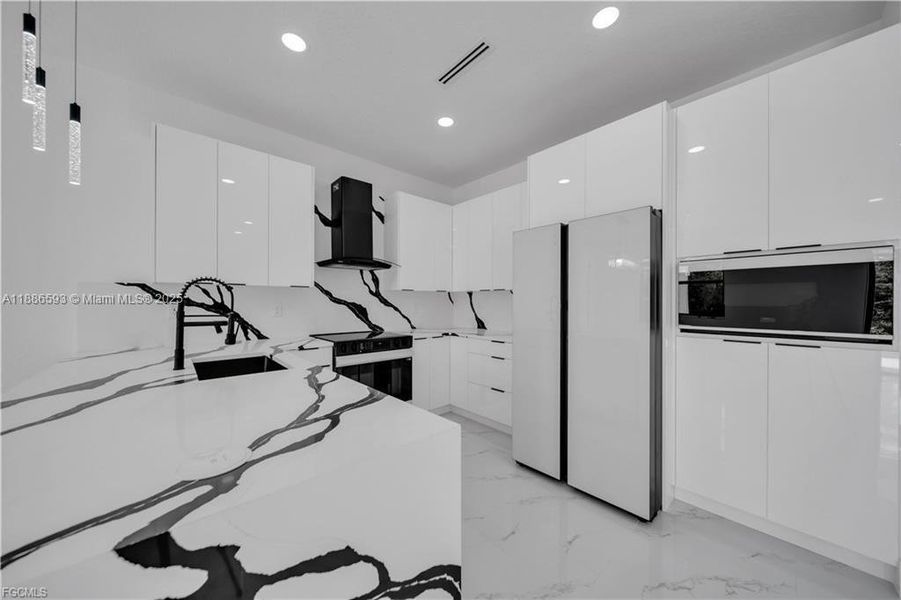 Furnished interior view inside a new home in , Lehigh Acres (Image 5). Furnished interior view inside a new home in , Lehigh Acres (Image 5).