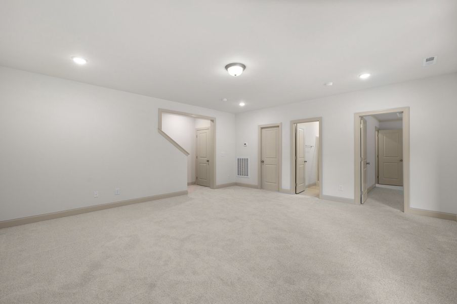 Representative unfurnished interior of a home built from the The Hampton by RobuckHomes in Baylee Ridge, Selma (Image 198).