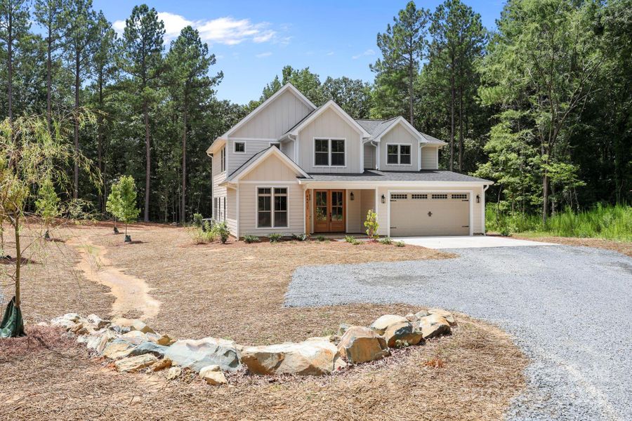 Front exterior of a new home in , Richfield, NC, highlighting curb appeal (Image 26).