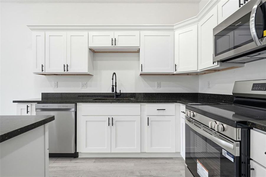 Furnished interior view inside a new home in , Haines City (Image 12).