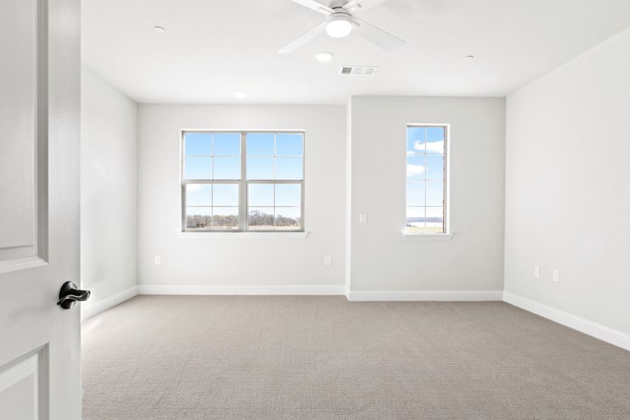 Spacious, unfurnished interior of a new home in The Tribute, The Colony (Image 38).