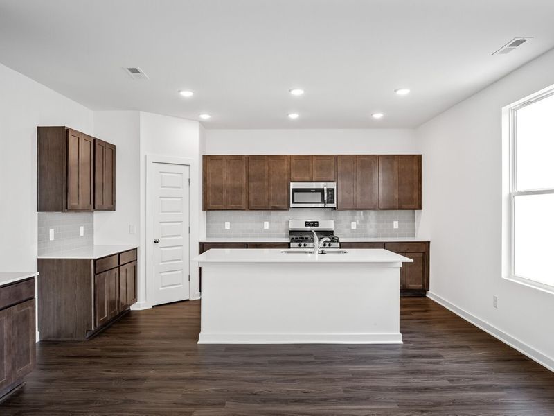 Furnished interior view inside a new home in Sage Farms, White House (Image 6).