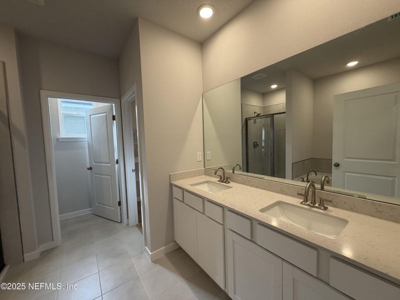 Furnished interior view inside a new home in The Magnolia Series at Reserve East, Flagler Beach (Image 13).