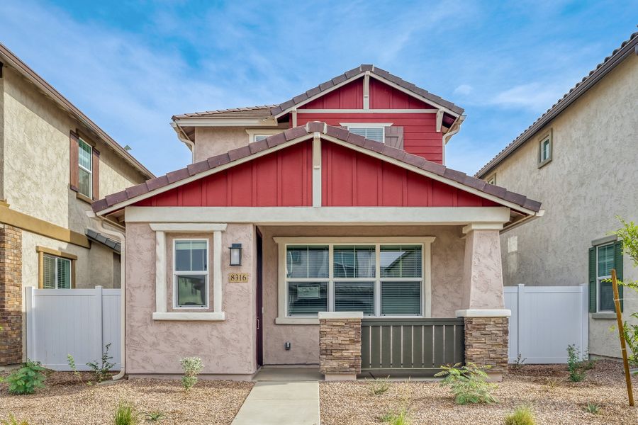 Front exterior of a new home in Hawes Crossing, Mesa, AZ, highlighting curb appeal (Image 1). Front exterior of a new home in Hawes Crossing, Mesa, AZ, highlighting curb appeal (Image 1).