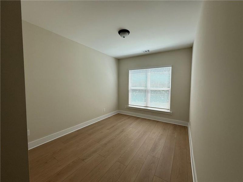 Spacious, unfurnished interior of a new home in Rose Creek, Cumming (Image 10).