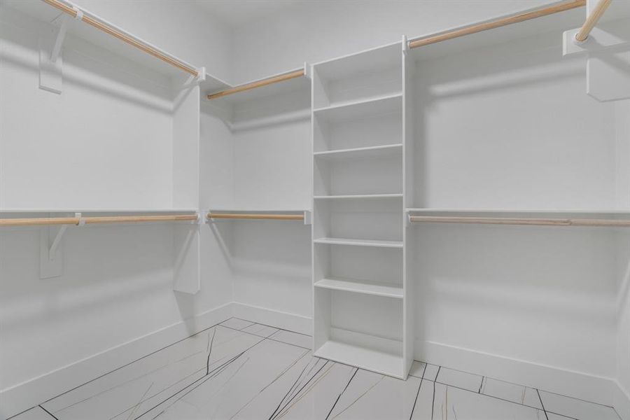 Spare room with a ceiling fan and carpet