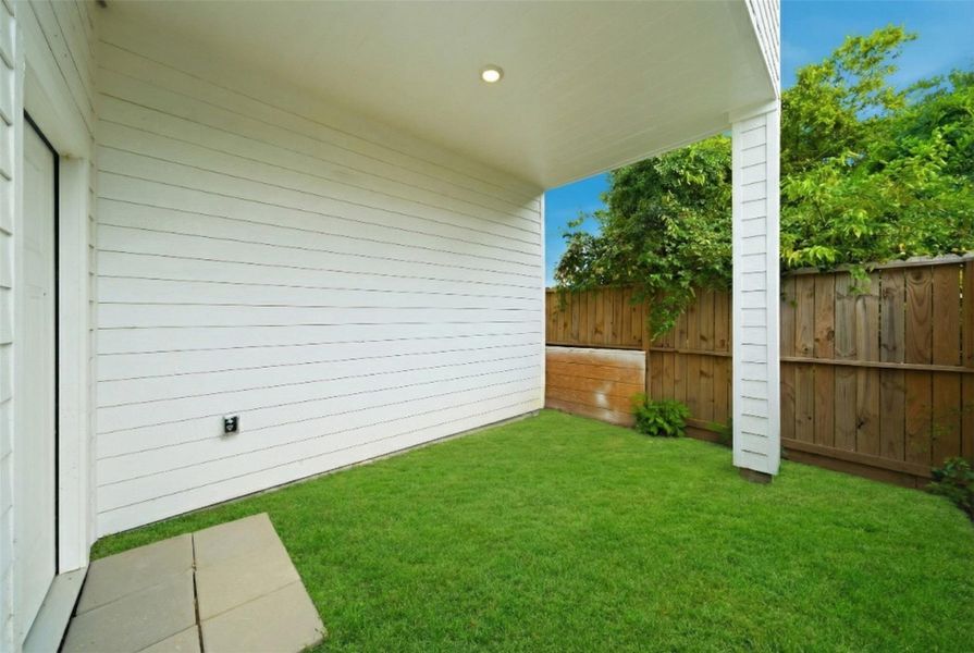 Exterior details and patio area of a home in , Houston (Image 3).