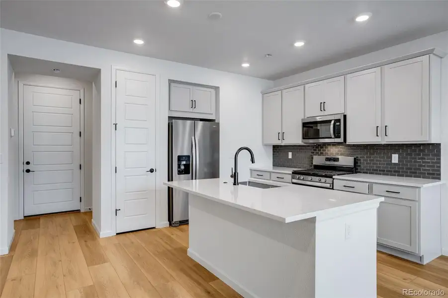 Furnished interior view inside a new home in Westside Crossing Townhomes, Berthoud (Image 14).