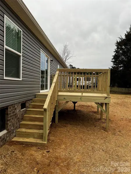 Exterior details and patio area of a home in , Troutman (Image 11). Exterior details and patio area of a home in , Troutman (Image 11).