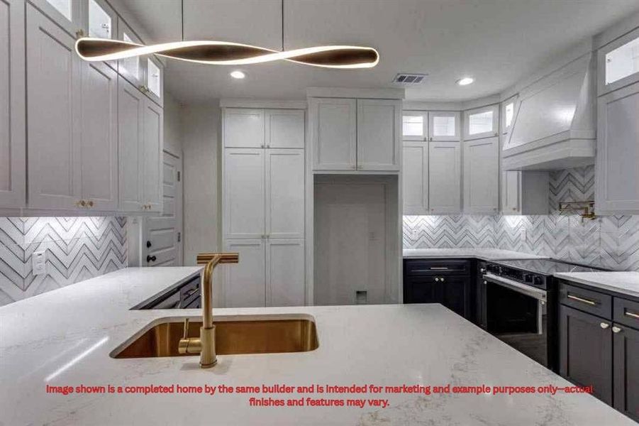 Kitchen featuring decorative backsplash, light stone counters, electric range, custom range hood, and recessed lighting Kitchen featuring decorative backsplash, light stone counters, electric range, custom range hood, and recessed lighting