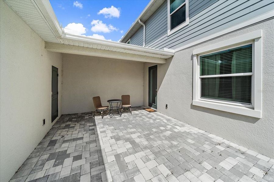 Exterior details and patio area of a home in , Sarasota (Image 3).