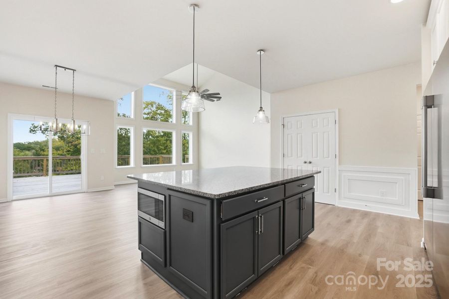 This culinary hub flows seamlessly into the Vaulted Great Room, creating the perfect space for daily living This culinary hub flows seamlessly into the Vaulted Great Room, creating the perfect space for daily living