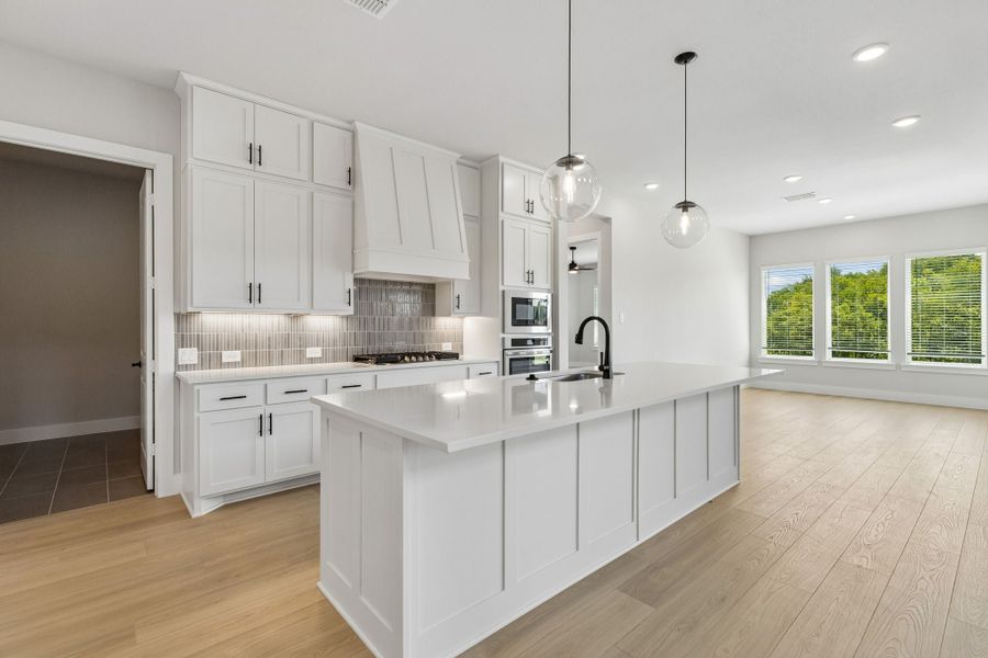 Furnished interior view inside a new home in Rainwater Crossing, Celina (Image 9).