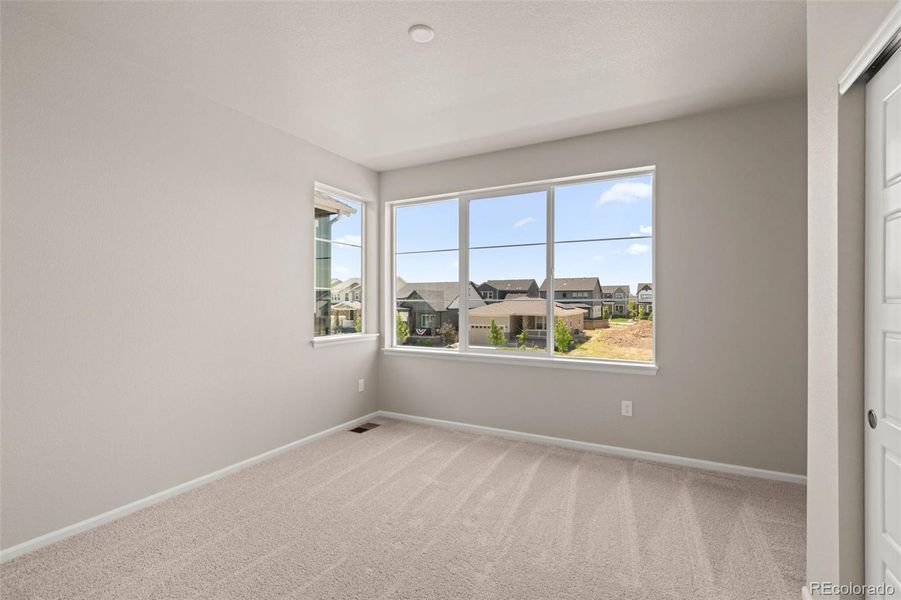 Spacious, unfurnished interior of a new home in Painted Prairie, Aurora (Image 39).