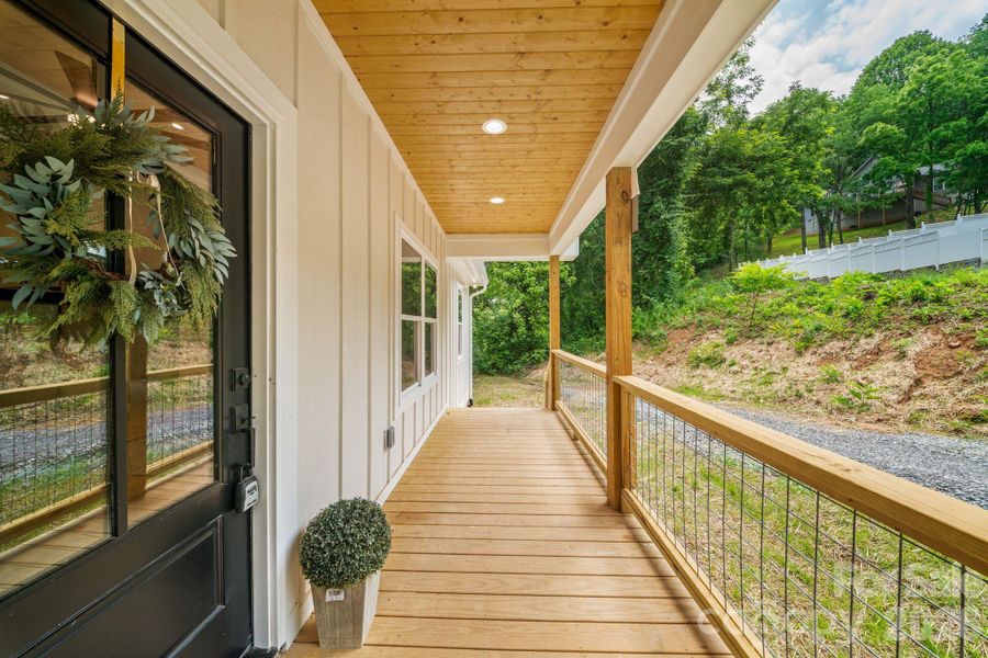 Exterior details and patio area of a home in , Waynesville (Image 24).