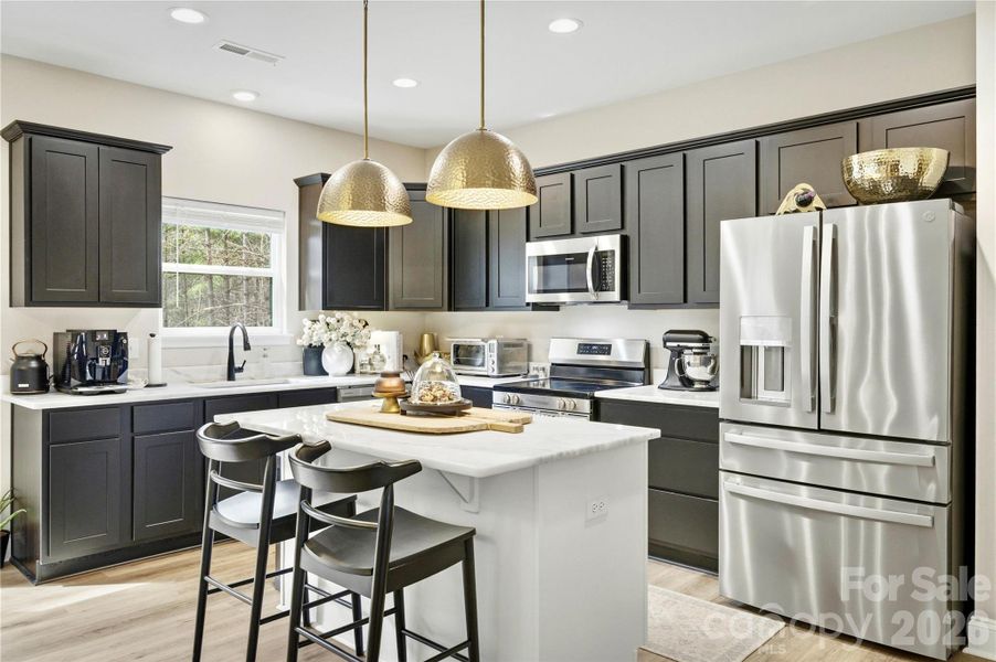 Furnished interior view inside a new home in , Lenoir (Image 13).