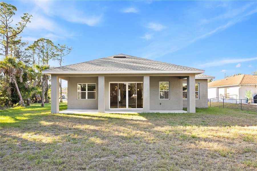 Exterior details and patio area of a home in , North Port (Image 27).