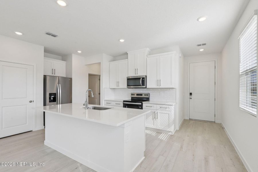 Furnished interior view inside a new home in Parkside at Shearwater, St. Augustine (Image 11).