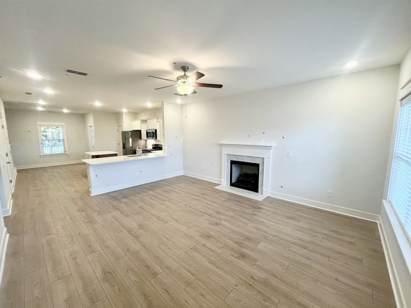 From front door looking across Great Room, Kitchen and dining area