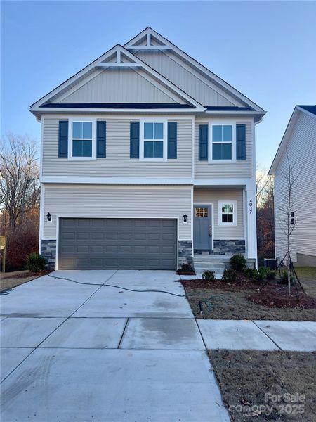 Front exterior of a new home in , Charlotte, NC, highlighting curb appeal (Image 2). Front exterior of a new home in , Charlotte, NC, highlighting curb appeal (Image 2).