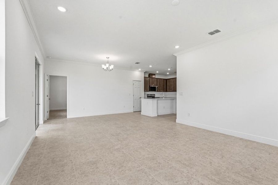 Spacious, unfurnished interior of a new home in Eden Hills, Lake Alfred (Image 34).