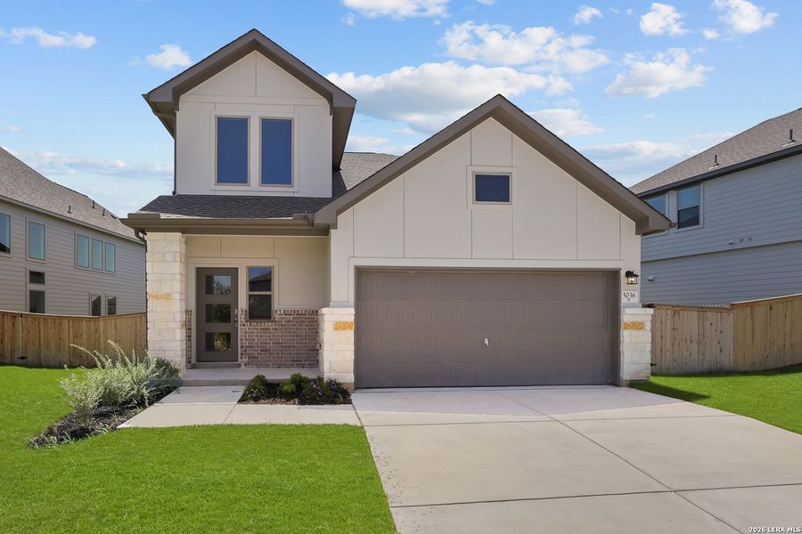 Front exterior of a new home in The Parklands, Schertz, TX, highlighting curb appeal (Image 2). Front exterior of a new home in The Parklands, Schertz, TX, highlighting curb appeal (Image 2).