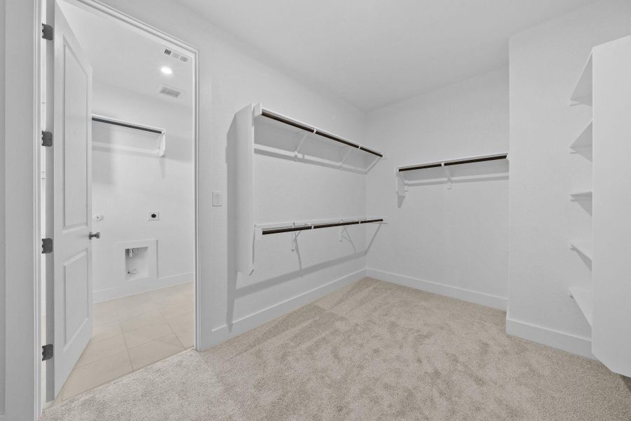 Walk-in closet in Primary Bedroom