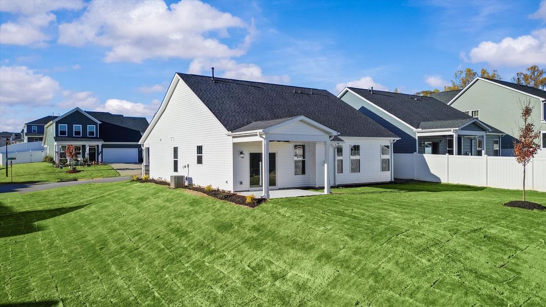 First-class design featuring a rear covered porch and tasteful architectural details