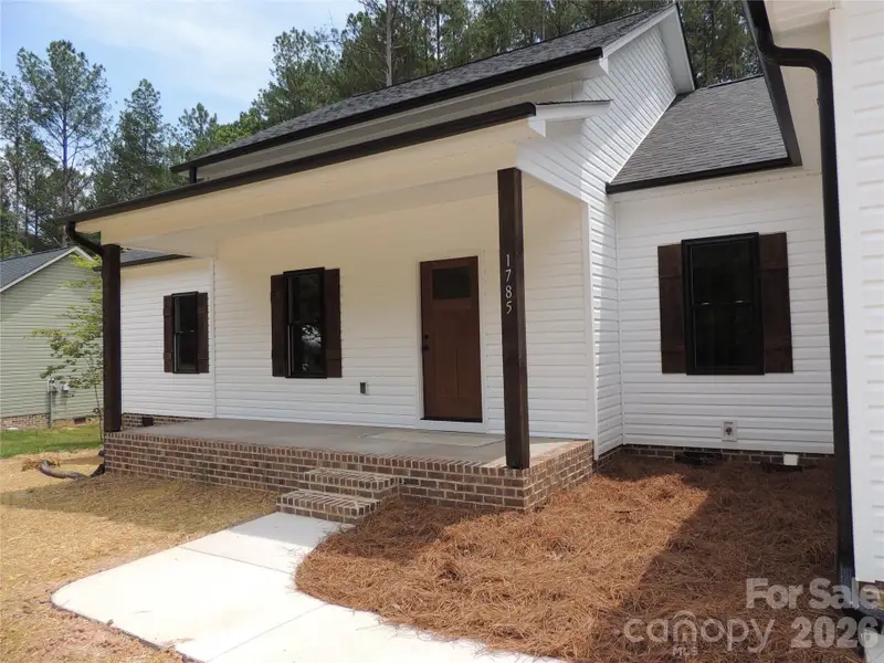 Exterior details and patio area of a home in , Iron Station (Image 3). Exterior details and patio area of a home in , Iron Station (Image 3).