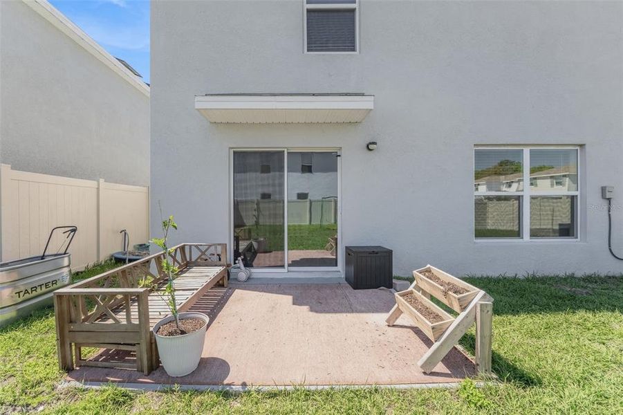 Exterior details and patio area of a home in Harvest Ridge, Zephyrhills (Image 3).