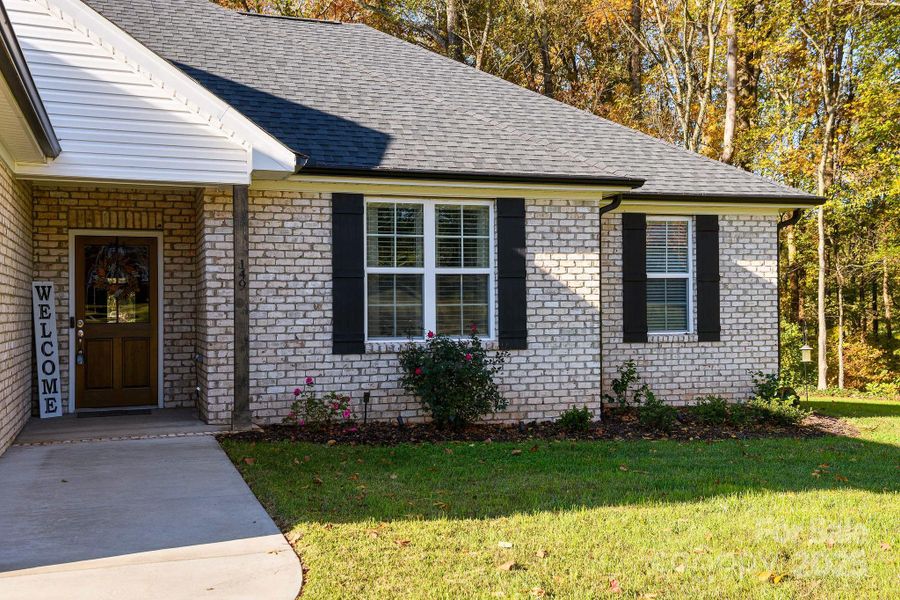 Exterior details and patio area of a home in , Mocksville (Image 23).