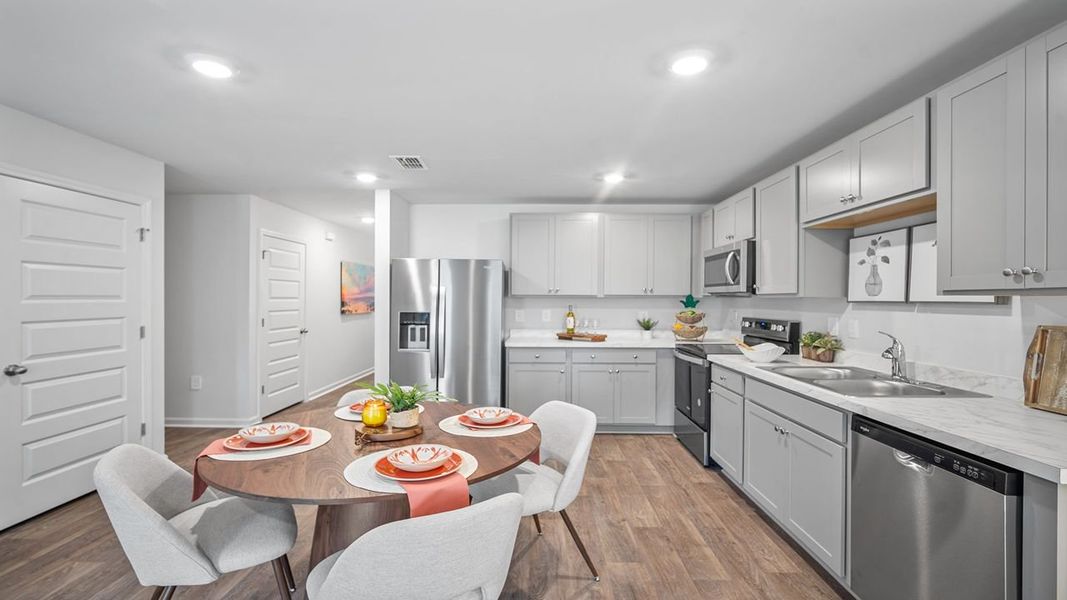 Representative furnished interior of a home built from the Sullivan by D.R. Horton in Rice Hope, Port Wentworth (Image 5).