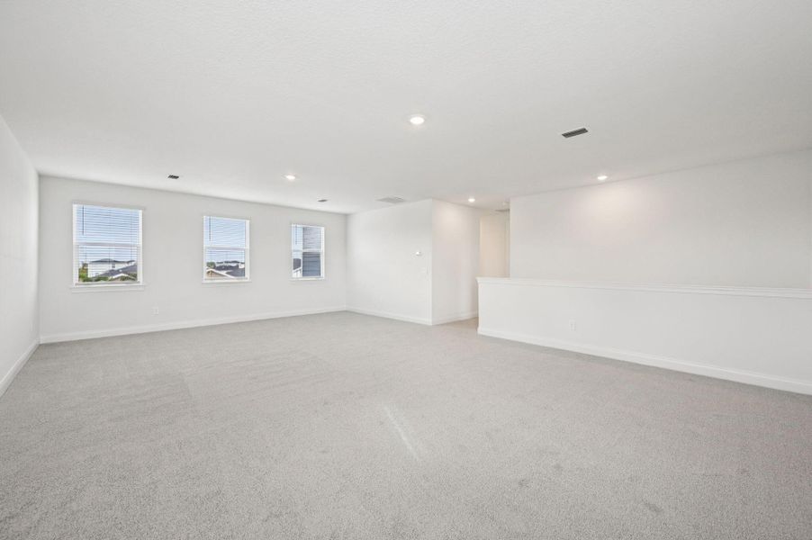 Spacious, unfurnished interior of a new home in Brystol at Wylder - Reserve Series, Port St. Lucie (Image 27).