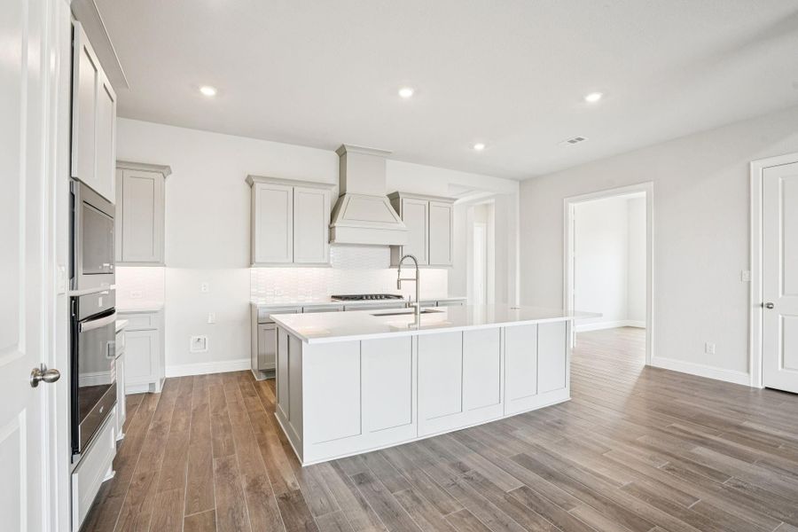 Furnished interior view inside a new home in Del Bello Lakes 60', Manvel (Image 8).