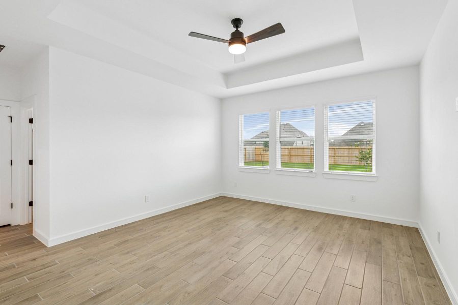 Spacious primary suite (*Photo not of actual home and used for illustration purposes only.)