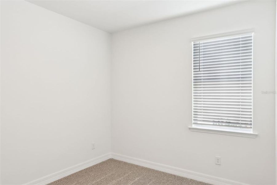 Spacious, unfurnished interior of a new home in Crescent Lakes - Reserve Series, Punta Gorda (Image 6). Spacious, unfurnished interior of a new home in Crescent Lakes - Reserve Series, Punta Gorda (Image 6).