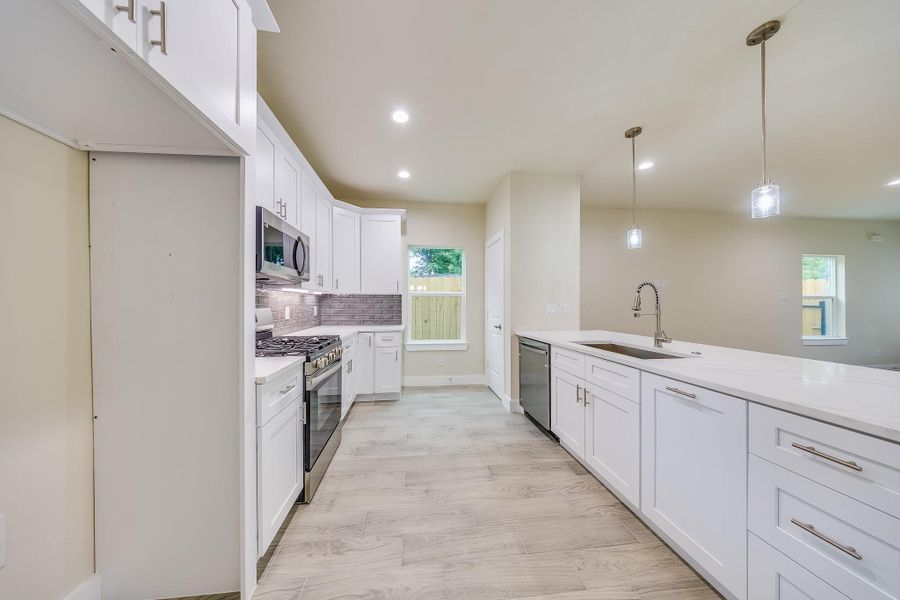 Beautiful gray backsplash adds style and sophistication to this modern kitchen. Come see it today! Beautiful gray backsplash adds style and sophistication to this modern kitchen. Come see it today!
