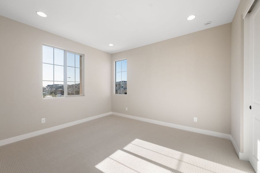Spacious, unfurnished interior of a new home in Legado West, Queen Creek (Image 24).