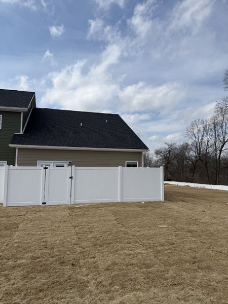 Exterior details and patio area of a home in Legacy Fields, Pleasant View (Image 14).