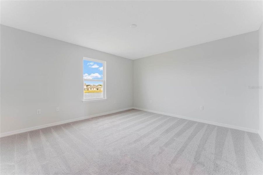 Spacious, unfurnished interior of a new home in Covered Bridge at Liberty Bluff, Haines City (Image 31).