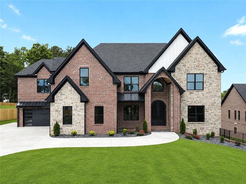 Front exterior of a new home in , Buford, GA, highlighting curb appeal (Image 30). Front exterior of a new home in , Buford, GA, highlighting curb appeal (Image 30).