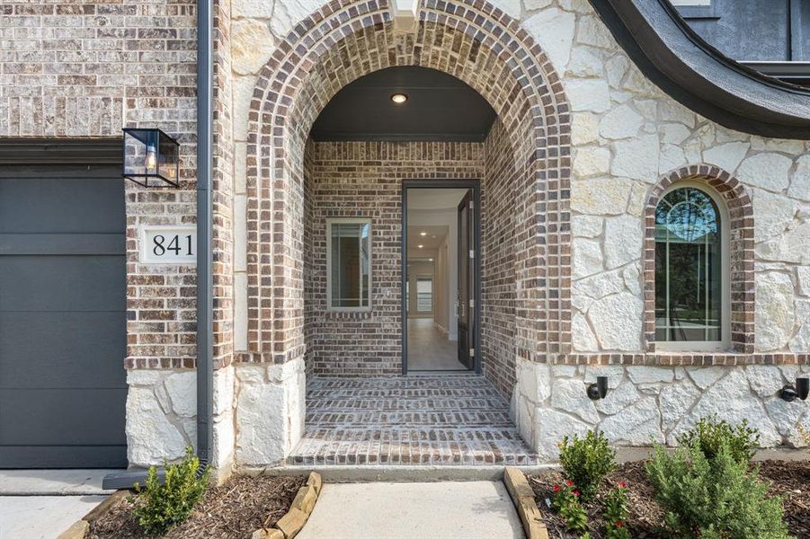 Front exterior of a new home in Union Park Classic 60, Little Elm, TX, highlighting curb appeal (Image 24). Front exterior of a new home in Union Park Classic 60, Little Elm, TX, highlighting curb appeal (Image 24).