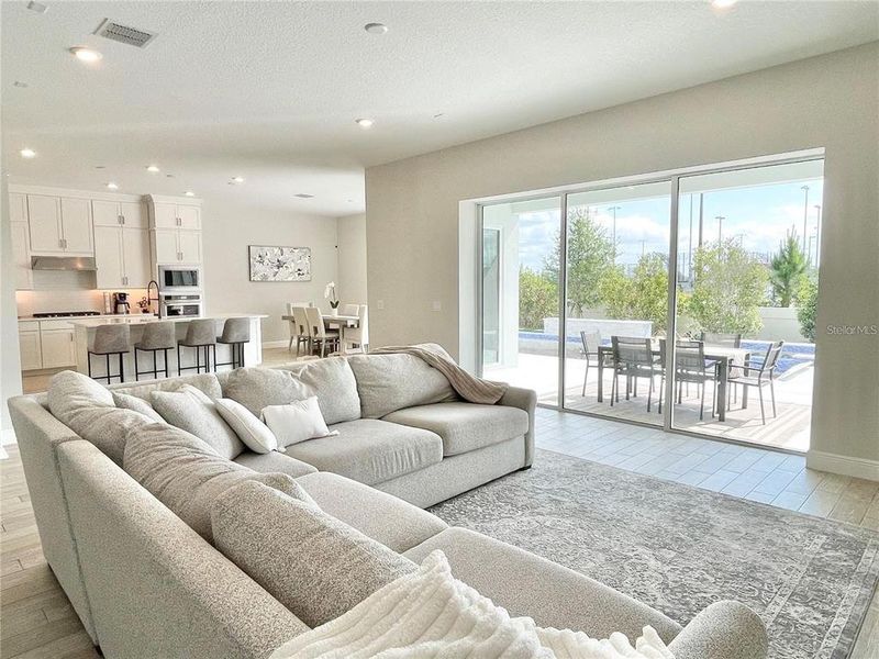 Furnished interior view inside a new home in Parkview Reserve, Orlando (Image 19).
