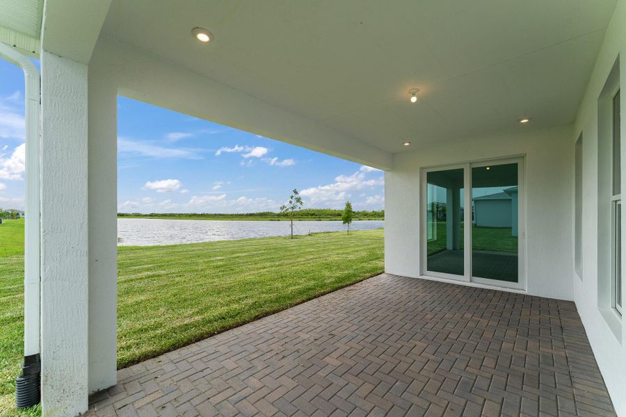 Exterior details and patio area of a home in Tradition - Kenley, Port St. Lucie (Image 1).